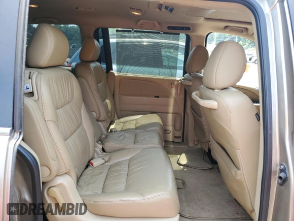 2008 Honda Odyssey Touring z VIN 5FNRL38968B025520, wystawiony jako Copart lot #60799645 z przebiegiem 116 592 mil mil oraz Szkoda całkowita • Salvage title. Historia ofert i sprzedaży dostępna na DreamBid. Obrazek 11.
