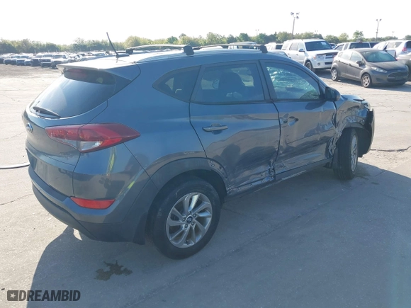 2016 Hyundai Tucson SE with VIN KM8J33A44GU209299, listed as a IAAI auction lot 41793611 with 42,417 mi miles. Bid and sale history available at carsss.com. Image 4.