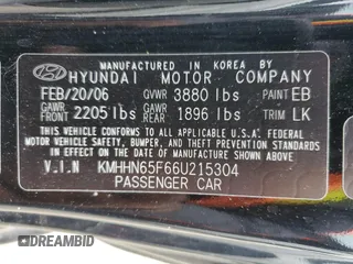 2006 Hyundai Tiburon GT z VIN KMHHN65F66U215304, wystawiony jako Copart lot #56141635 z przebiegiem 149 118 mil mil oraz Szkoda całkowita • Salvage title. Historia ofert i sprzedaży dostępna na DreamBid. Obrazek 12.