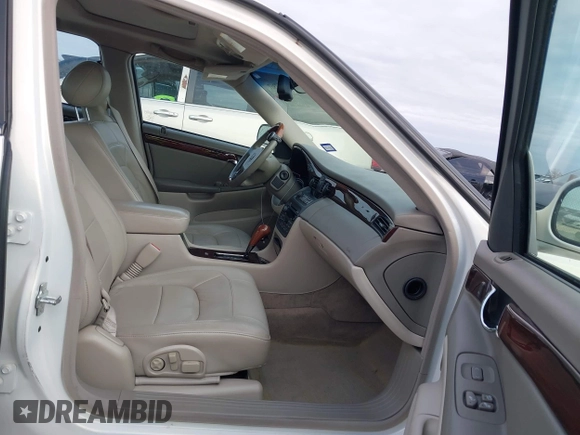 2004 Cadillac DeVille DTS z VIN 1G6KF579X4U238691, wystawiony jako IAAI lot #41367367 z przebiegiem 69 902 mil mil oraz . Historia ofert i sprzedaży dostępna na DreamBid. Obrazek 5.