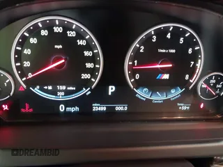 2014 BMW M6 z VIN WBSLZ9C58EDZ78401, wystawiony jako IAAI lot #41840114 z przebiegiem 23 499 mil mil oraz . Historia ofert i sprzedaży dostępna na DreamBid. Obrazek 7.