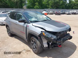2024 Jeep Compass Trailhawk with VIN 3C4NJDDN8RT596877, listed as a IAAI auction lot 42095414 with 31,691 mi miles and . Bid and sale history available at DreamBid. Image 1.
