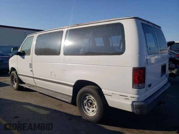 2004 Ford Econoline Passenger XL with VIN 1FMRE11W84HA50164, listed as a Copart auction lot 73438464 with 148,916 mi miles and Clean Title. Bid and sale history available at DreamBid. Image 2.