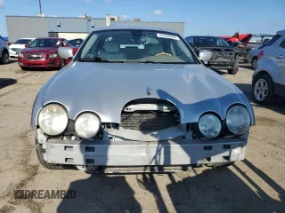 2002 Jaguar S-Type with VIN SAJDA01P52GM27504, listed as a Copart auction lot 57850944 with 119,707 mi miles and Clean Title. Bid and sale history available at DreamBid. Image 5.