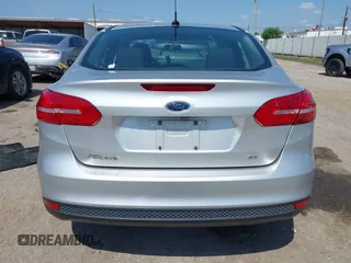 2017 Ford Focus SE with VIN 1FADP3F2XHL256136, listed as a IAAI auction lot 42215479 with 89,945 mi miles and . Bid and sale history available at DreamBid. Image 16.