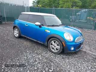 2012 MINI Hardtop with VIN WMWSU3C54CT255840, listed as a IAAI auction lot 42312952 with 94,614 mi miles and . Bid and sale history available at DreamBid. Image 1.