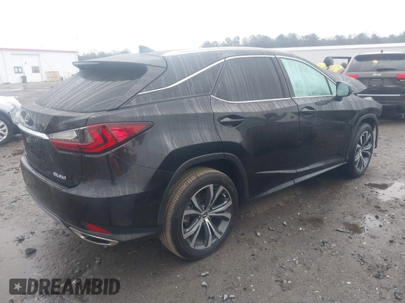 2022 Lexus RX with VIN 2T2HZMAA7NC256569, listed as a IAAI auction lot 41544198 with 17,605 mi miles. Bid and sale history available at carsss.com. Image 4.