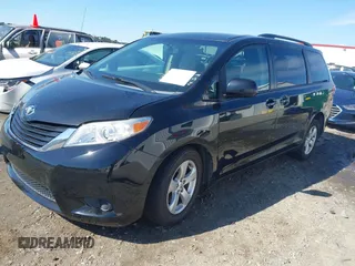 2012 Toyota Sienna LE AAS with VIN 5TDKK3DC3CS263240, listed as a IAAI auction lot 41810686 with 232,026 mi miles. Bid and sale history available at carsss.com. Image 2.