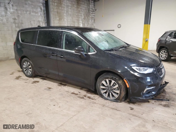 2023 Chrysler Pacifica Hybrid Touring L with VIN 2C4RC1L73PR631113, listed as a Copart auction lot 51678545 with 51,023 mi miles and Clean Title. Bid and sale history available at carsss.com. Image 4.