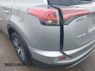 2018 Toyota RAV4 XLE with VIN 2T3WFREV3JW445654, listed as a IAAI auction lot 40849666 with 69,365 mi miles and . Bid and sale history available at DreamBid. Image 18.