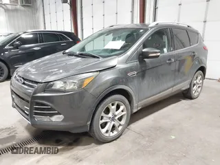 2016 Ford Escape Titanium with VIN 1FMCU9J93GUC39933, listed as a IAAI auction lot 42616323 with 116,482 mi miles and . Bid and sale history available at DreamBid. Image 2.