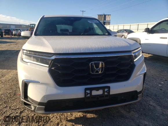 2024 Honda Pilot EX-L 8 Passenger with VIN 5FNYG1H43RB017787, listed as a Copart auction lot 74529124 with 26,197 mi miles and Salvage Title. Bid and sale history available at carsss.com. Image 5.