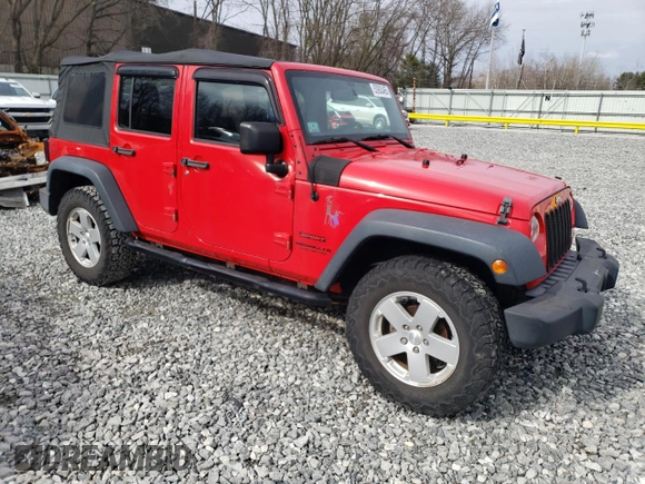 2015 Jeep Wrangler Unlimited Willys Wheeler with VIN 1C4BJWDG2FL542045, listed as a Copart auction lot 52903465 with 86,205 mi miles and Clean Title. Bid and sale history available at DreamBid. Image 4.