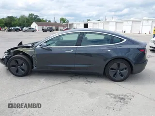 2018 Tesla Model 3 Long Range Battery with VIN 5YJ3E1EB3JF119498, listed as a IAAI auction lot 41966643 with 45,566 mi miles and . Bid and sale history available at DreamBid. Image 15.
