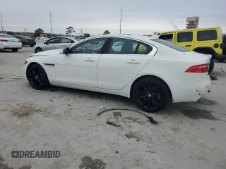 2019 Jaguar XE 25t with VIN SAJAS4FX5KCP51107, listed as a Copart auction lot 44332255 with 101,036 mi miles and Salvage Title. Bid and sale history available at carsss.com. Image 2.