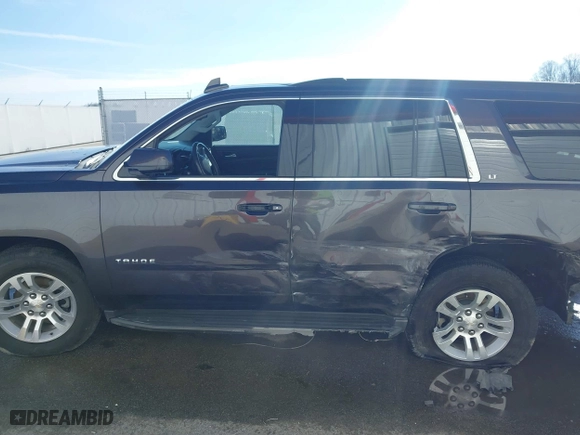 2018 Chevrolet Tahoe LT with VIN 1GNSKBKC4JR261190, listed as a IAAI auction lot 41548734 with 142,800 mi miles. Bid and sale history available at carsss.com. Image 15.