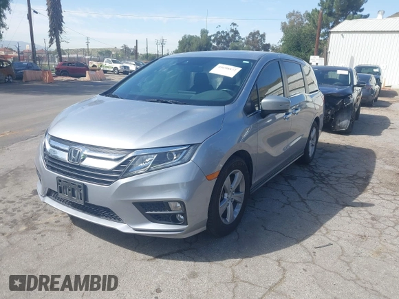 2020 Honda Odyssey EX-L with VIN 5FNRL6H7XLB017154, listed as a IAAI auction lot 41698872 with 54,626 mi miles. Bid and sale history available at carsss.com. Image 2.