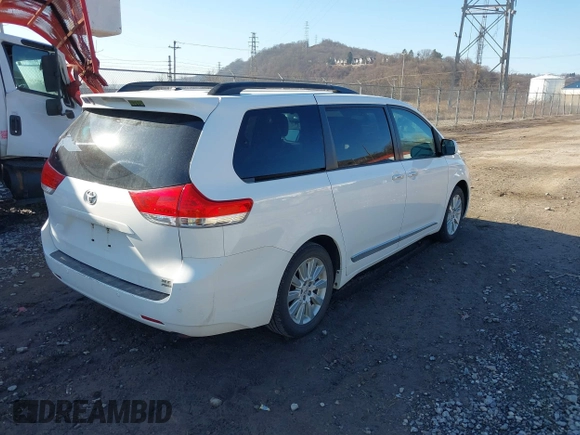 2014 Toyota Sienna Ltd with VIN 5TDDK3DC6ES076778, listed as a IAAI auction lot 41387091 with 173,497 mi miles. Bid and sale history available at carsss.com. Image 4.