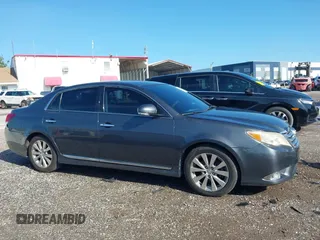2011 Toyota Avalon with VIN 4T1BK3DB5BU371257, listed as a IAAI auction lot 42543983 with 111,502 mi miles and . Bid and sale history available at DreamBid. Image 14.