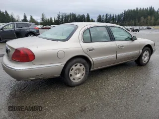 2002 Lincoln Continental with VIN 1LNHM97V22Y693053, listed as a Copart auction lot 85540044 with 179,465 mi miles and Salvage Title. Bid and sale history available at carsss.com. Image 3.