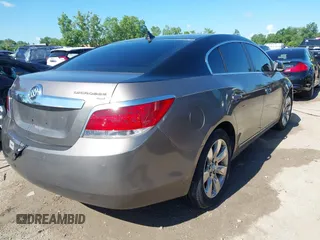 2010 Buick LaCrosse CXL z VIN 1G4GC5EGXAF285504, wystawiony jako IAAI lot #42632282 z przebiegiem 149 095 mil mil oraz . Historia ofert i sprzedaży dostępna na DreamBid. Obrazek 4.