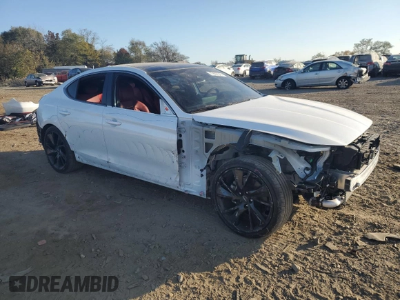 2023 Genesis G70 2.0T with VIN KMTG34TA1PU134120, listed as a Copart auction lot 77657374 with 12,024 mi miles and Salvage Title. Bid and sale history available at DreamBid. Image 4.