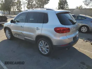 2013 Volkswagen Tiguan S with VIN WVGAV7AX8DW501081, listed as a Copart auction lot 88065365 with 157,312 mi miles and Salvage title. Bid and sale history available at DreamBid. Image 2.
