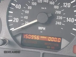 1997 BMW 3 Series 1.9L with VIN 4USCH7322VLB82833, listed as a IAAI auction lot 41981003 with 150,956 mi miles. Bid and sale history available at carsss.com. Image 7.