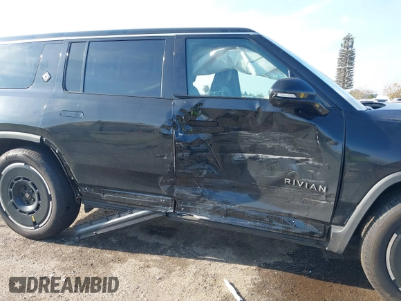 2025 Rivian R1S Adventure with VIN 7PDSGBBAXSN055849, listed as a IAAI auction lot 41255282 with 2,885 mi miles. Bid and sale history available at carsss.com. Image 6.