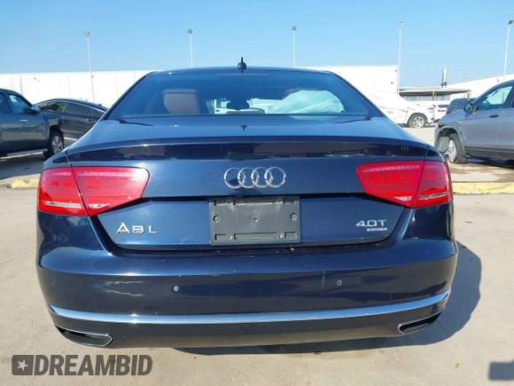 2013 Audi A8 L 4.0L with VIN WAUR2AFD3DN012893, listed as a IAAI auction lot 41209419 with 116,990 mi miles. Bid and sale history available at carsss.com. Image 16.