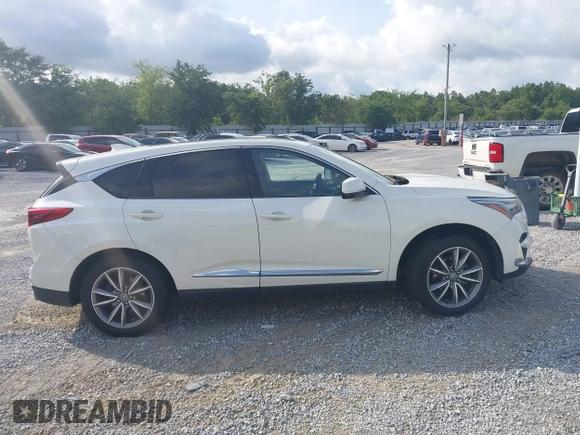 2019 Acura RDX Technology with VIN 5J8TC2H50KL000390, listed as a IAAI auction lot 42420742 with 91,176 mi miles and . Bid and sale history available at DreamBid. Image 14.