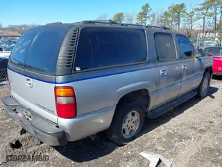 2002 Chevrolet Suburban LS with VIN 3GNEC16Z72G291904, listed as a IAAI auction lot 41831851 with 999,999 mi miles. Bid and sale history available at carsss.com. Image 4.