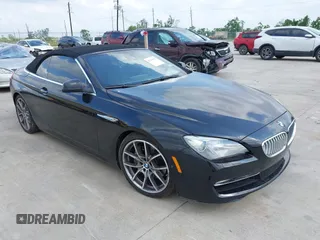 2012 BMW 6 Series 650i z VIN WBALZ3C58CDL70649, wystawiony jako IAAI lot #42155370 z przebiegiem 58 382 mil mil oraz . Historia ofert i sprzedaży dostępna na DreamBid. Obrazek 1.