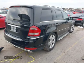 2012 Mercedes-Benz GL 450 z VIN 4JGBF7BE7CA795275, wystawiony jako IAAI lot #41274429 z przebiegiem 141 818 mil mil oraz . Historia ofert i sprzedaży dostępna na DreamBid. Obrazek 4.