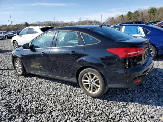 2018 Ford Focus SE with VIN 1FADP3FE9JL306394, listed as a Copart auction lot 52902175 with 77,338 mi miles and Salvage title. Bid and sale history available at DreamBid. Image 2.