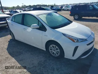 2022 Toyota Prius L Eco with VIN JTDKAMFUXN3163123, listed as a IAAI auction lot 41666679 with 68,026 mi miles. Bid and sale history available at carsss.com. Image 1.
