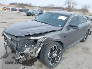 2014 Ford Taurus SHO with VIN 1FAHP2KT7EG127513, listed as a IAAI auction lot 41845257 with 1 mi miles. Bid and sale history available at carsss.com. Image 2.