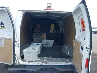 2010 Ford Econoline Cargo Commercial with VIN 1FTNE1EW8ADA91801, listed as a IAAI auction lot 41940231 with 201,516 mi miles and . Bid and sale history available at carsss.com. Image 8.