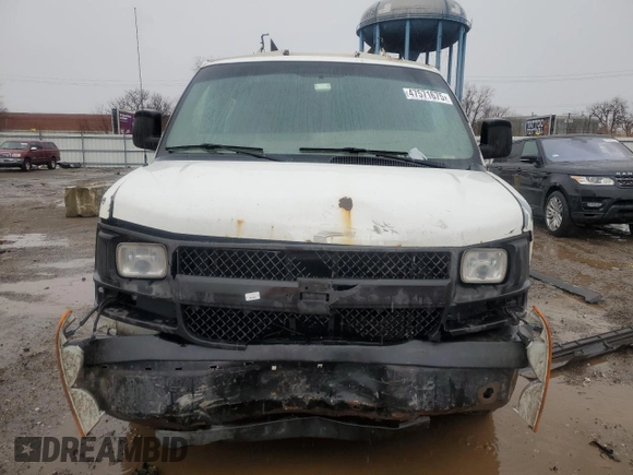 2003 Chevrolet Express Cargo z VIN 1GCHG35UX31215671, wystawiony jako Copart lot #47571675 z przebiegiem Nie podano mil oraz Szkoda całkowita • Salvage title. Historia ofert i sprzedaży dostępna na DreamBid. Obrazek 5.