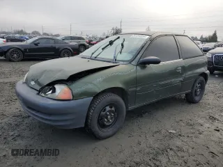 1999 Chevrolet Metro with VIN 2C1MR2268X6701369, listed as a Copart auction lot 84494354 with 156,275 mi miles and Salvage Title. Bid and sale history available at DreamBid. Image 1.