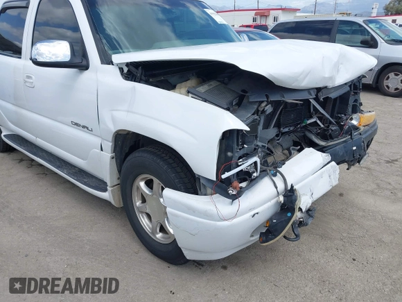 2003 GMC Yukon XL Denali with VIN 1GKFK66UX3J227538, listed as a IAAI auction lot 41915607 with 150,173 mi miles. Bid and sale history available at carsss.com. Image 17.