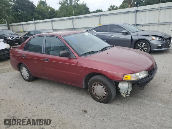 1997 Mitsubishi Mirage DE z VIN JA3AY26AXVU007285, wystawiony jako Copart lot #71958454 z przebiegiem 156 415 mil mil oraz Szkoda całkowita • Salvage title. Historia ofert i sprzedaży dostępna na DreamBid. Obrazek 4.