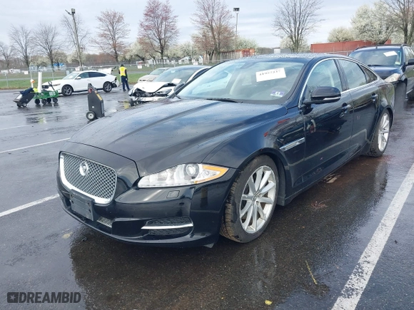 2011 Jaguar XJ with VIN SAJWA1CB8BLV12389, listed as a IAAI auction lot 41957217 with 51,585 mi miles. Bid and sale history available at carsss.com. Image 2.