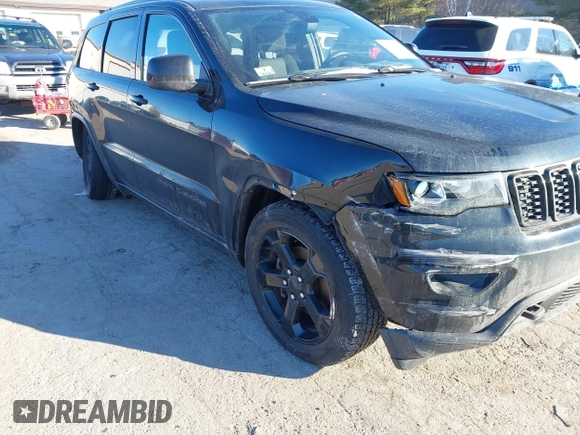 2018 Jeep Grand Cherokee Laredo E with VIN 1C4RJFAGXJC375588, listed as a IAAI auction lot 41406344 with 69,989 mi miles. Bid and sale history available at carsss.com. Image 6.
