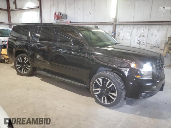 2019 Chevrolet Suburban Premier with VIN 1GNSKJKJ3KR150429, listed as a Copart auction lot 60276664 with 54,739 mi miles and Salvage Title. Bid and sale history available at DreamBid. Image 4.