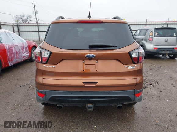 2017 Ford Escape Titanium with VIN 1FMCU9J99HUB75687, listed as a IAAI auction lot 41180789 with 108,967 mi miles. Bid and sale history available at carsss.com. Image 17.