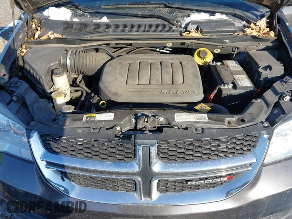 2016 Dodge Grand Caravan SE with VIN 2C4RDGBG1GR211030, listed as a IAAI auction lot 41386099 with 73,244 mi miles and . Bid and sale history available at DreamBid. Image 10.