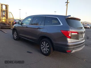 2021 Honda Pilot EX-L with VIN 5FNYF5H54MB018846, listed as a IAAI auction lot 41208987 with 80,757 mi miles and . Bid and sale history available at DreamBid. Image 3.