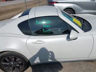 2020 Mazda MX-5 Miata Grand Touring с VIN JM1NDAM73L0414658, выставлен на аукционе IAAI как лот 42451595 с пробегом 73 339 миль миль и . История ставок и продаж доступна на DreamBid. Изображение 13.