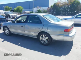 2001 Toyota Camry CE with VIN JT2BG22K810539653, listed as a IAAI auction lot 42236078 with 241,250 mi miles and . Bid and sale history available at DreamBid. Image 3.